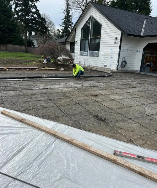Broom Finish Driveway Replacement With Decorative Borders in Newcastle 